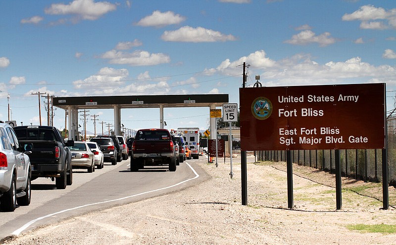 Cars wait to enter Fort Bliss in El Paso, Texas, in this Sept. 9, 2014 file photo. (AP/Juan Carlos Llorca)