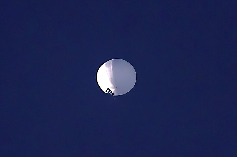 A high altitude balloon floats over Billings, Mont., on Wednesday, Feb. 1, 2023. (Larry Mayer/The Billings Gazette via AP)