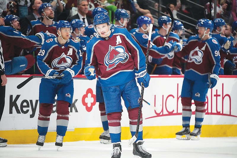 Avalanche defenseman Cale Makar gestures after scoring a goal during a game last month against the Red wings in Denver. (Associated Press)