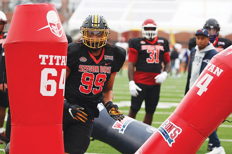 Defensive lineman Isaiah McGuire of Missouri runs through drills during practice Thursday for the Senior Bowl in Mobile, Ala. (Associated Press)