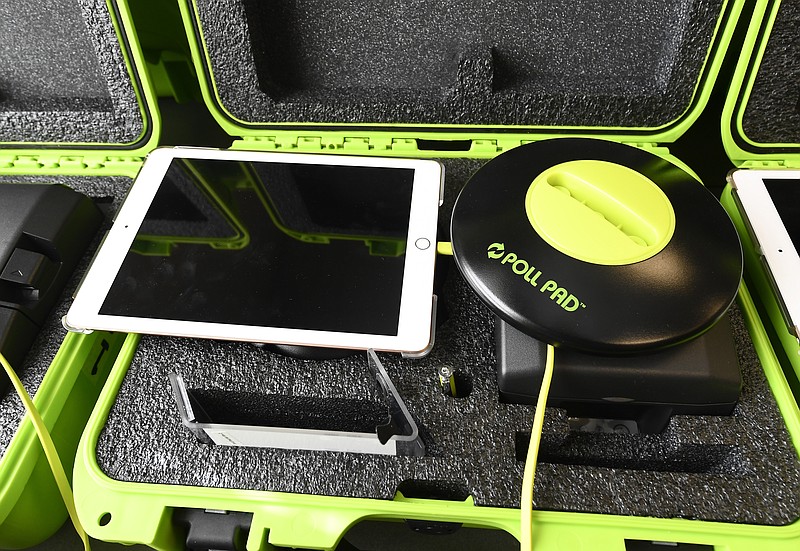 FILE - Electronic poll book kit that voters will use to sign in at polling locations at the Albany County Board of Elections building, Oct. 14, 2020, in Albany, N.Y. (AP Photo/Hans Pennink, File)