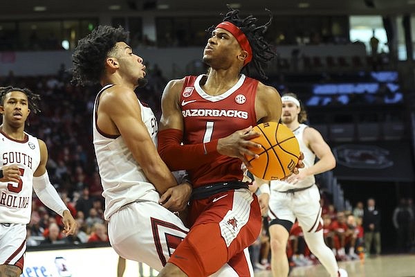 Arkansas junior Ricky Council (1) drives to the basket during a game against South Carolina on Saturday, Feb. 4, 2023, in Columbia, S.C.