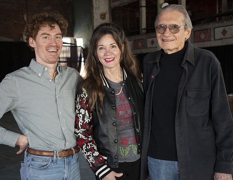 Matt McCoy, director of Friends of Dreamland, and his mother, Kerry McCoy, who owns Taborian Hall, stand with longtime volunteer Richard Davis. They collaborate each year for Dancing Into Dreamland, which raises money for the restoration of the Dreamland Ballroom, on the third floor of Taborian Hall.
(Arkansas Democrat-Gazette/Cary Jenkins)