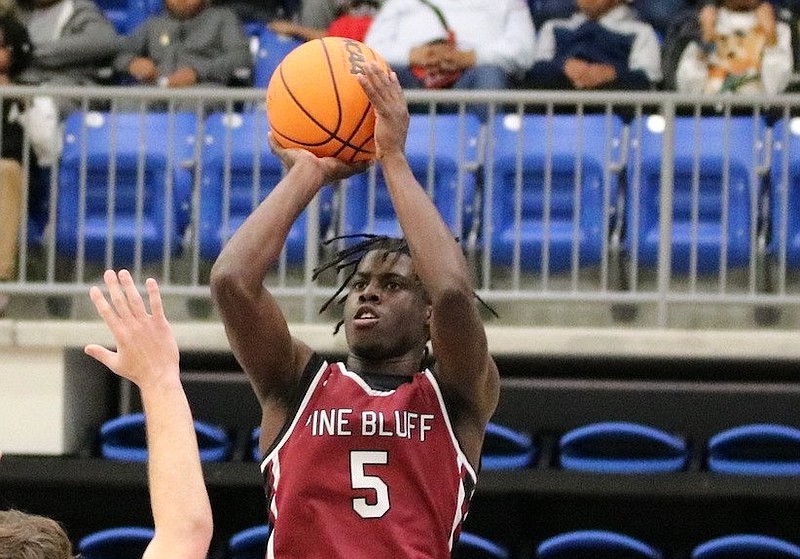 Courtney Crutchfield of the Pine Bluff Zebras pulls up on the baseline for a shot in this Jan. 27, 2023 file photo. (Special to The Commercial/Jamie Hooks)