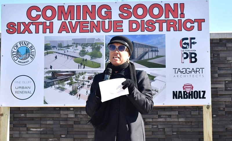 Pine Bluff Urban Renewal Agency Director Chandra Griffin speaks to visitors during a tour of ongoing projects across the city Dec. 15. (Pine Bluff Commercial/I.C. Murrell)