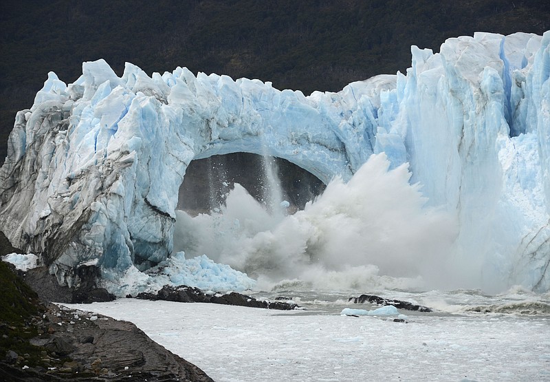 FILE - Chunks of ice break off the Perito Moreno Glacier, in Lake Argentina, at Los Glaciares National Park, near El Calafate, in Argentina's Patagonia region, March 10, 2016. (AP Photo/Francisco Munoz, File)