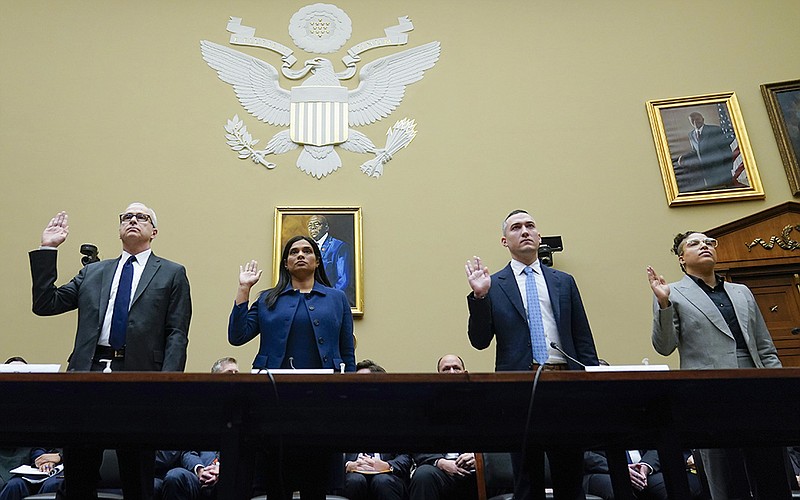 Former Twitter executives James Baker (from left), Vijaya Gadde and Yoel Roth and former Twitter employee Anika Collier Navaroli are sworn in for a House Committee on Oversight and Accountability hearing Wednesday in Washington.
(AP/Carolyn Kaster)