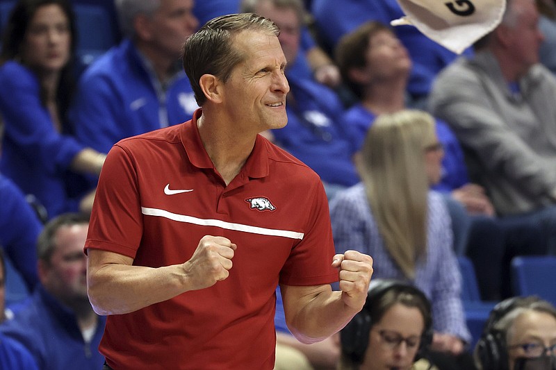 Arkansas Coach Eric Musselman exhorts his players during a victory over Kentucky at Rupp Arena in Lexington, Ky. (AP/James Crisp)