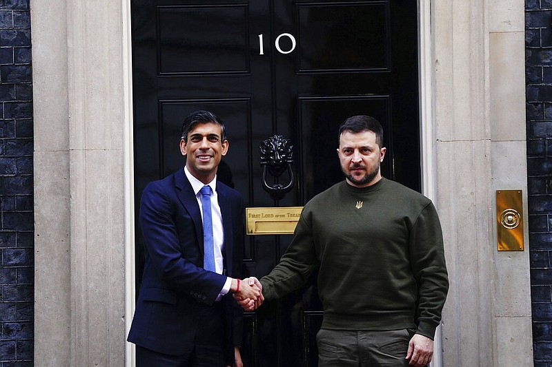 Britain's Prime Minister Rishi Sunak, left, welcomes Ukraine's President Volodymyr Zelenskyy at Downing Street in London, Wednesday, Feb. 8, 2023. (Victoria Jones/PA via AP)