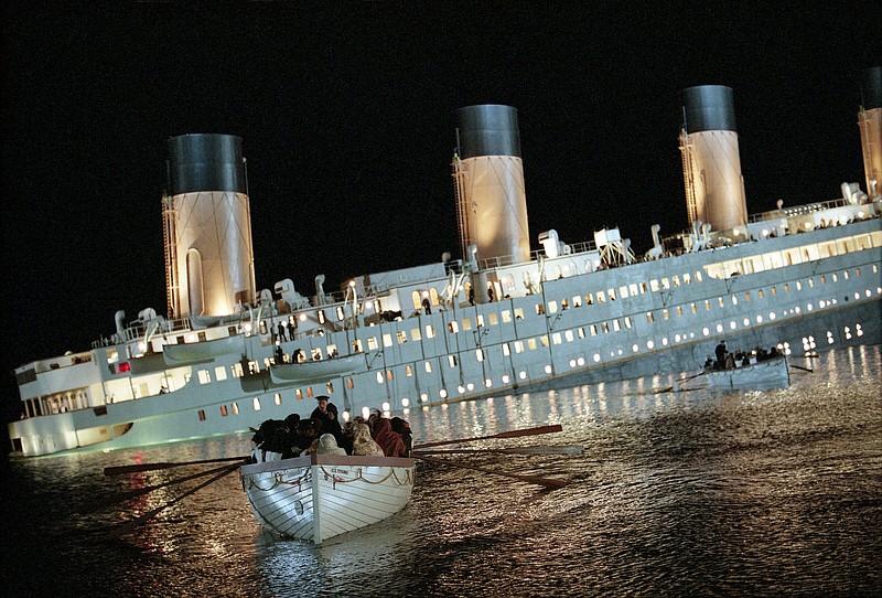 Row, row, row: The “unsinkable” luxury liner credibly does just that in James Cameron’s effects spectacular “Titanic,” which is being re-released after 25 years.