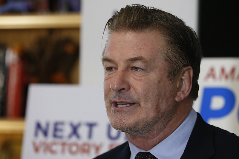 FILE - Actor Alec Baldwin, speaks to supporters of Amanda Pohl, candidate for Virginia Senate District 11 in her home in Midlothian, Va., Tuesday, Oct. 22, 2019. (AP Photo/Steve Helber, File)