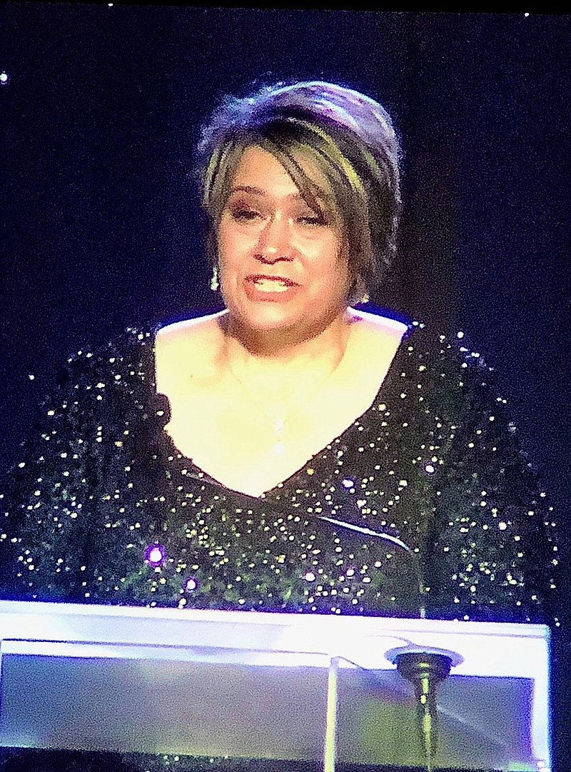 Women & Children First Executive Director Angela McGraw speaks during the agency's 17th annual Woman of the Year gala, honoring Marisa Nabholz and held Feb. 4, 2023, in the Grand Ballroom of the Little Rock Marriott..(Arkansas Democrat-Gazette -- Helaine R. Williams)
