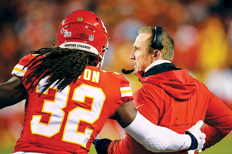 Chiefs linebacker Nick Bolton talks to defensive coordinator Steve Spagnuolo during the AFC Championship Game against the Bengals last month at Arrowhead Stadium in Kansas City. (Associated Press)