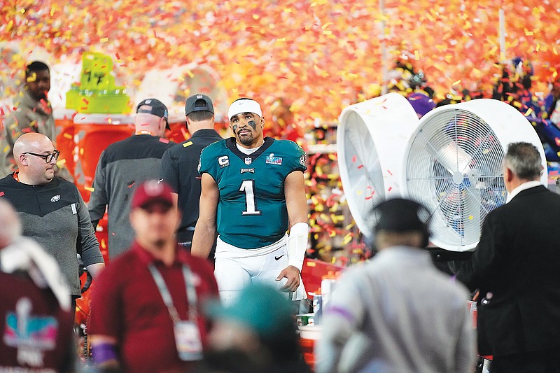 Eagles quarterback Jalen Hurts walks off the field after Sunday night’s 38-35 loss to the Chiefs in Super Bowl LVII in Glendale, Ariz. (Associated Press)