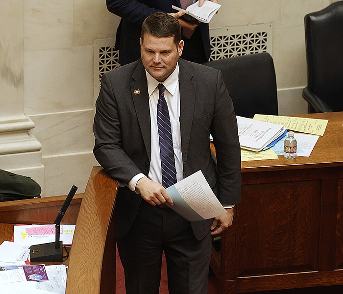 Sen. Bart Hester, R-Cave Springs, walks to the well to introduce a resolution that would extend the General Assembly session through April 7, during the Senate session on Monday, Feb. 13, 2023, at the state Capitol in Little Rock. .(Arkansas Democrat-Gazette/Thomas Metthe)