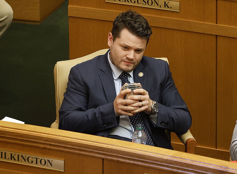 Rep. Aaron Pilkington, R-Knoxville, listens to debate after introducing HB1006, a bill that would require certain employers to provide paid maternity leave, during the House session on Monday, Feb. 13, 2023, at the state Capitol in Little Rock..(Arkansas Democrat-Gazette/Thomas Metthe)