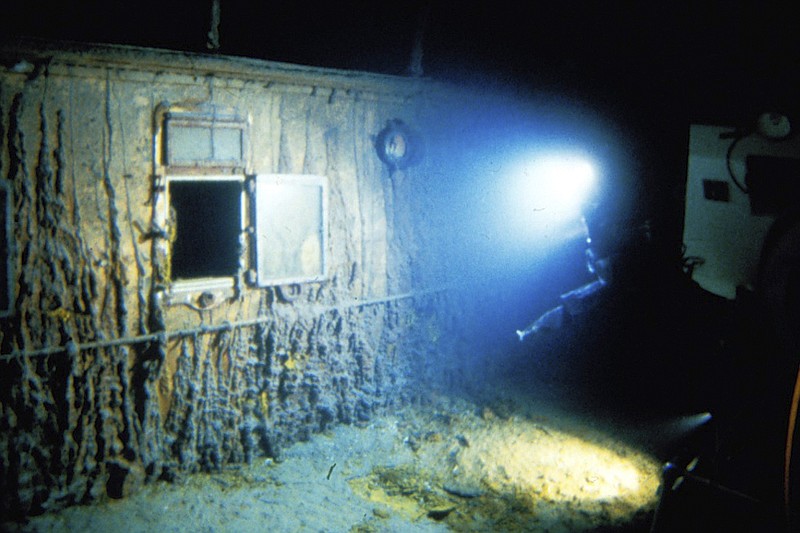 This image provided by the Woods Hole Oceanographic Institution shows the deck of Titanic 12,500 feet (3.8 kilometers) below the surface of the ocean, 400 miles (640 kilometers) off the coast of Newfoundland, Canada in 1986. Rare and in some cases never before publicly seen video of the dive is being released on Wednesday, Feb. 15, 2023, by the Woods Hole Oceanographic Institution. (Woods Hole Oceanographic Institution via AP)