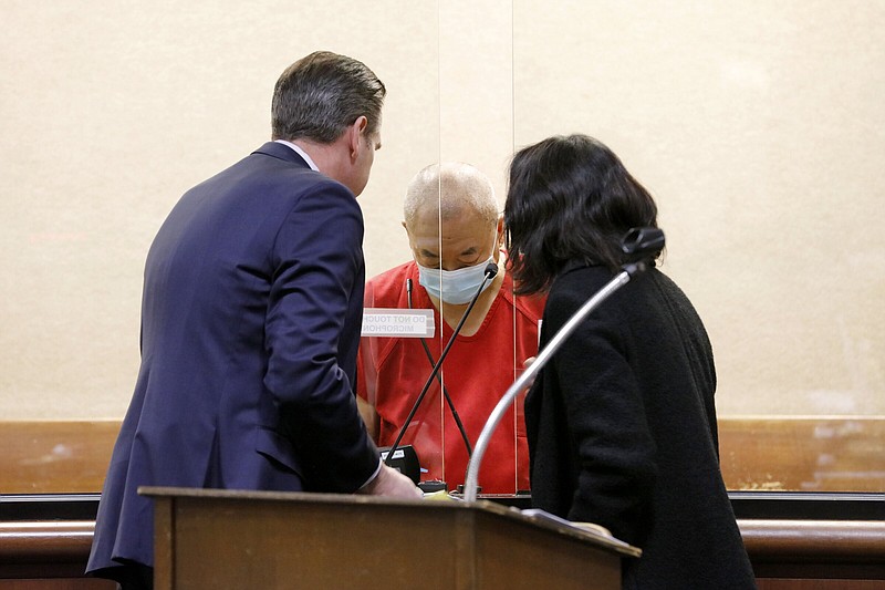Chunli Zhao (center) appears for a plea hearing Thursday with defense attorney Eric Hove (left) at San Mateo Superior Court in Redwood City, Calif.
(AP/Zuma Press/David G. McIntyre)