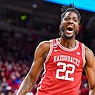 Arkansas forward/center Makhel Mitchell (22) reacts after this dunk, Saturday, Feb. 18, 2023, during the second half of the Razorbacks’ 84-65 win over the Florida Gators at Bud Walton Arena in Fayetteville.