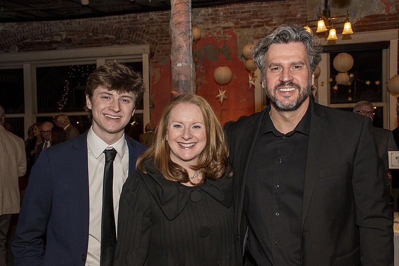 Corbin Pitts with his parents Christin and Kyle Pitts  on 2/11/2023 at Dancing into Dreamland in Dreamland Ballroom. (Arkansas Democrat-Gazette/Cary Jenkins)