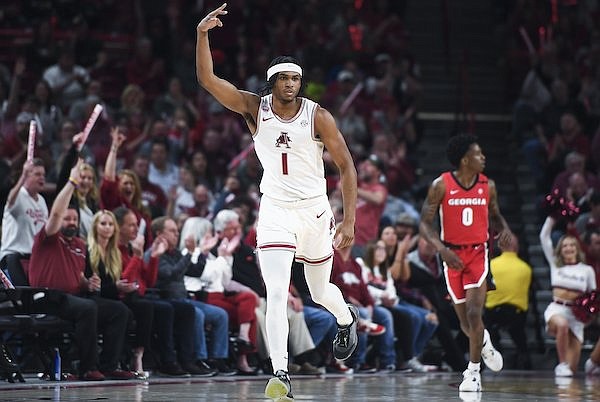 Arkansas guard Ricky Council celebrates a field goal during a game against Georgia on Tuesday, Feb. 21, 2023, in Fayetteville.