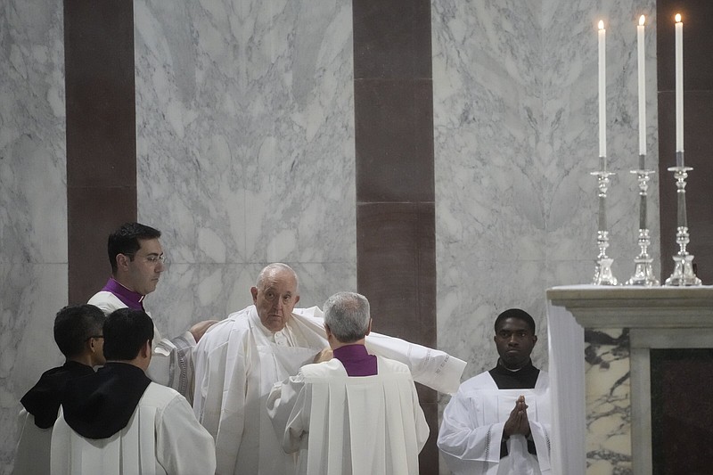 Pope Francis (center) arrives at the Basilica of Santa Sabina in Rome where he celebrated Mass on Ash Wednesday, which opens the Lenten season of abstinence and deprivation for Christians before Holy Week and Easter.
(AP/Gregorio Borgia)