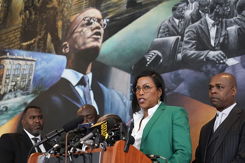 Ilyasah Shabazz, a daughter of Malcolm X, second from right, speaks during a news conference at the Malcolm X & Dr. Betty Shabazz Memorial and Educational Center in New York, Tuesday, Feb. 21, 2023. Some of Malcom X's family members and their attorneys announced their intent to sue governmental agencies for Malcom X's assassination and the fraudulent concealment of evidence surrounding the murder. In 1965, minister and civil rights activist Malcolm X, 39, was shot to death inside Harlem's Audubon Ballroom in New York. (AP Photo/Seth Wenig)