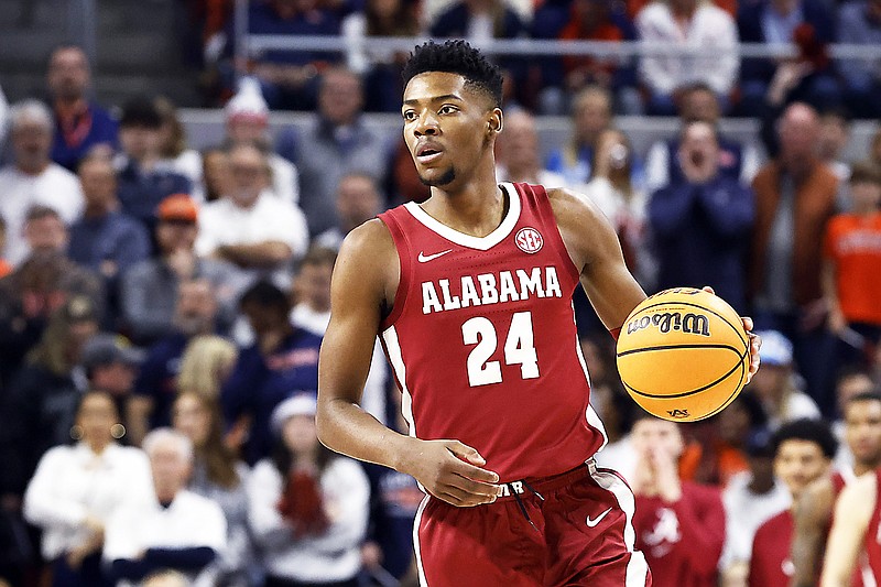 Alabama forward Brandon Miller brings the ball up the court during a game against Auburn earlier this month in Auburn, Ala. (Associated Press)