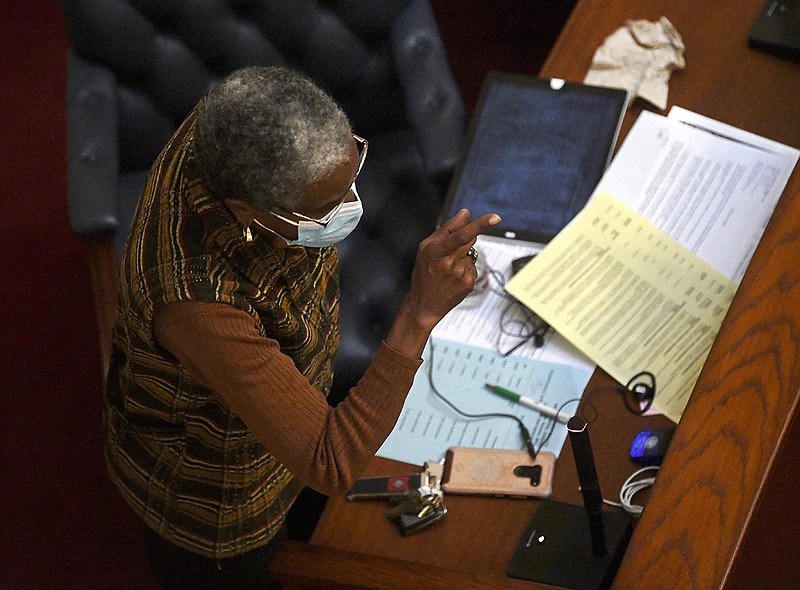 Sen. Stephanie Flowers, D-Pine Bluff, raises an argument Thursday in the Senate as Sen. Dan Sullivan presents his bill that would strike a defense statute from state law protecting public library staff from criminal liability for distributing obscene material.
(Arkansas Democrat-Gazette/Stephen Swofford)