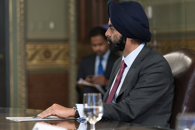 Ajay Banga, former chairman of Mastercard, listens during a meeting with Vice President Kamala Harris and business leaders about economic development in 2021.
(AP)
