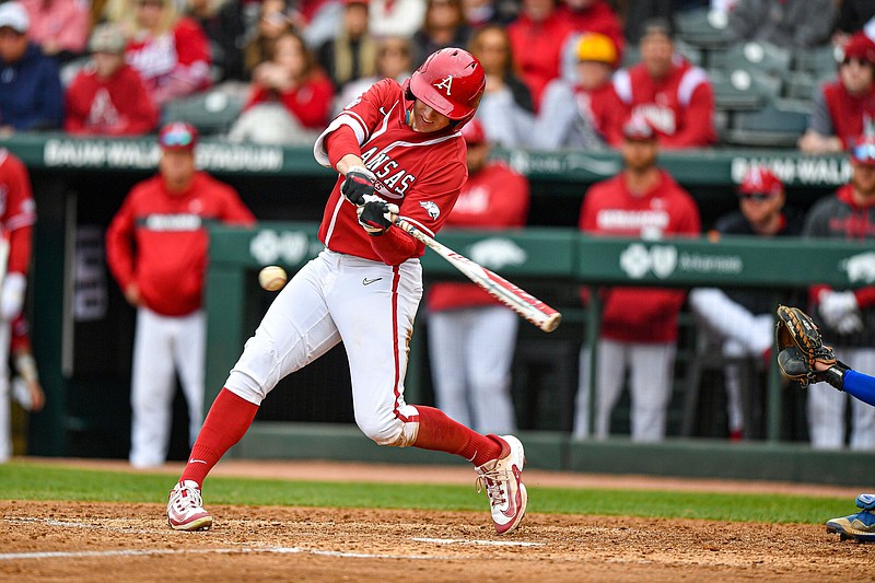 Arkansas outfielder Jace Bohrofen (8) hits a two-run double, Saturday, Feb. 25, 2023, during the eighth inning of the Razorbacks’ 10-3 win over the Eastern Illinois Panthers at Baum-Walker Stadium in Fayetteville. Visit nwaonline.com/photo for today's photo gallery..(NWA Democrat-Gazette/Hank Layton)