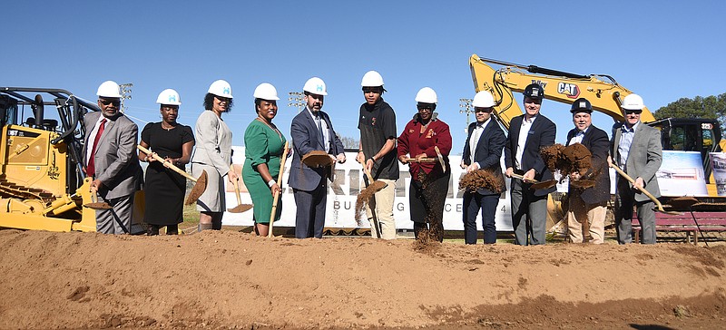 Staff photo by Matt Hamilton / Officials turn the first shovels of soil during the groundbreaking ceremony at Tyner Academy on Tuesday, February 28, 2023.