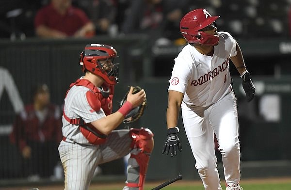 Arkansas designated hitter Kendall Diggs connects Wednesday, March 1, 2023, with an RBI double to score second baseman Peyton Stovall from second base during the 11th inning of the Razorbacks’ 10-9 over Illinois State at Baum-Walker Stadium in Fayetteville.