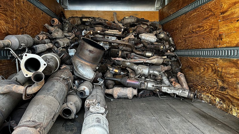 FILE - This photo provided by the Phoenix Police Department shows stolen catalytic converters that were recovered after detectives served a search warrant at a storage unit in Phoenix, May 27, 2022. The Minnesota Senate voted 40-25 on Thursday, March 2, 2023, to make it harder for thieves to sell stolen catalytic converters, a crime that has skyrocketed across the country in recent years. (Phoenix Police Department via AP, File)