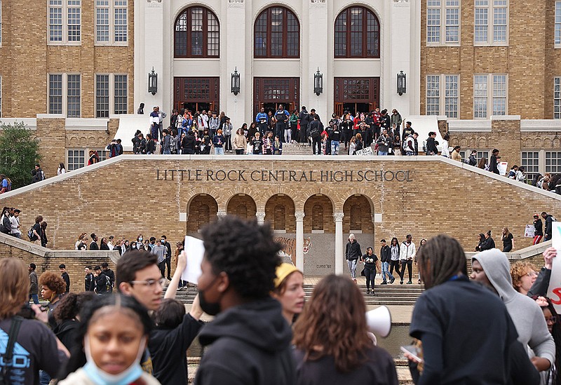 Little Rock Central High School students stream out of the historic building during Friday’s walkout. Student council President Steve Abochale said the protest aimed to “set an example” and raise awareness about Senate Bill 294.
(Arkansas Democrat-Gazette/Colin Murphey)