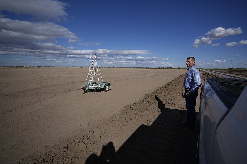 Tom Brundy looks over a field Tuesday that is in preparation for planting at his farm near Calexico, Calif.
(AP/Gregory Bull)