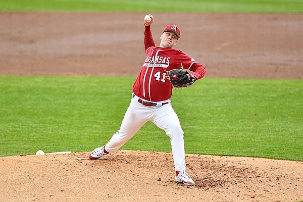 Arkansas starting pitcher Will McEntire (41) delivers to the plate, Saturday, Feb. 25, 2023, during the third inning of the Razorbacks’ 10-3 win over the Panthers at Baum-Walker Stadium in Fayetteville.