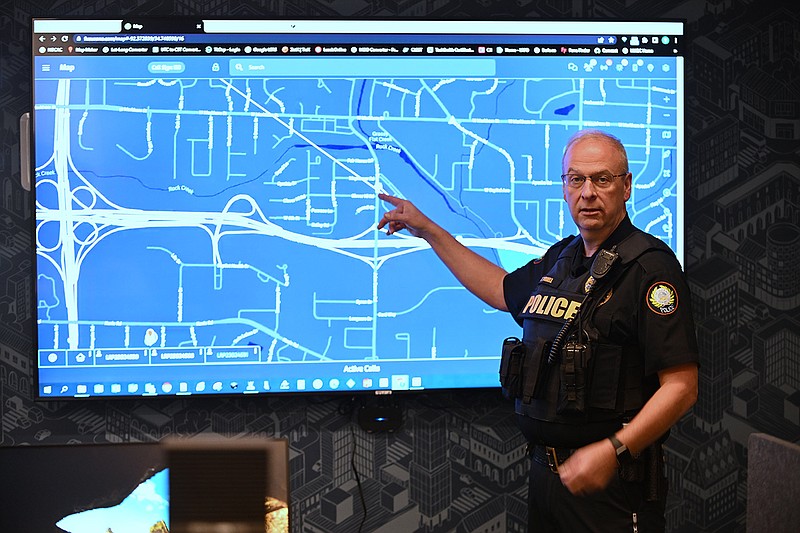Maj. Ty Tyrrell shows how the Real-time Crime Center technology works Friday at the Little Rock Police Department headquarters.
(Arkansas Democrat-Gazette/Staci Vandagriff)