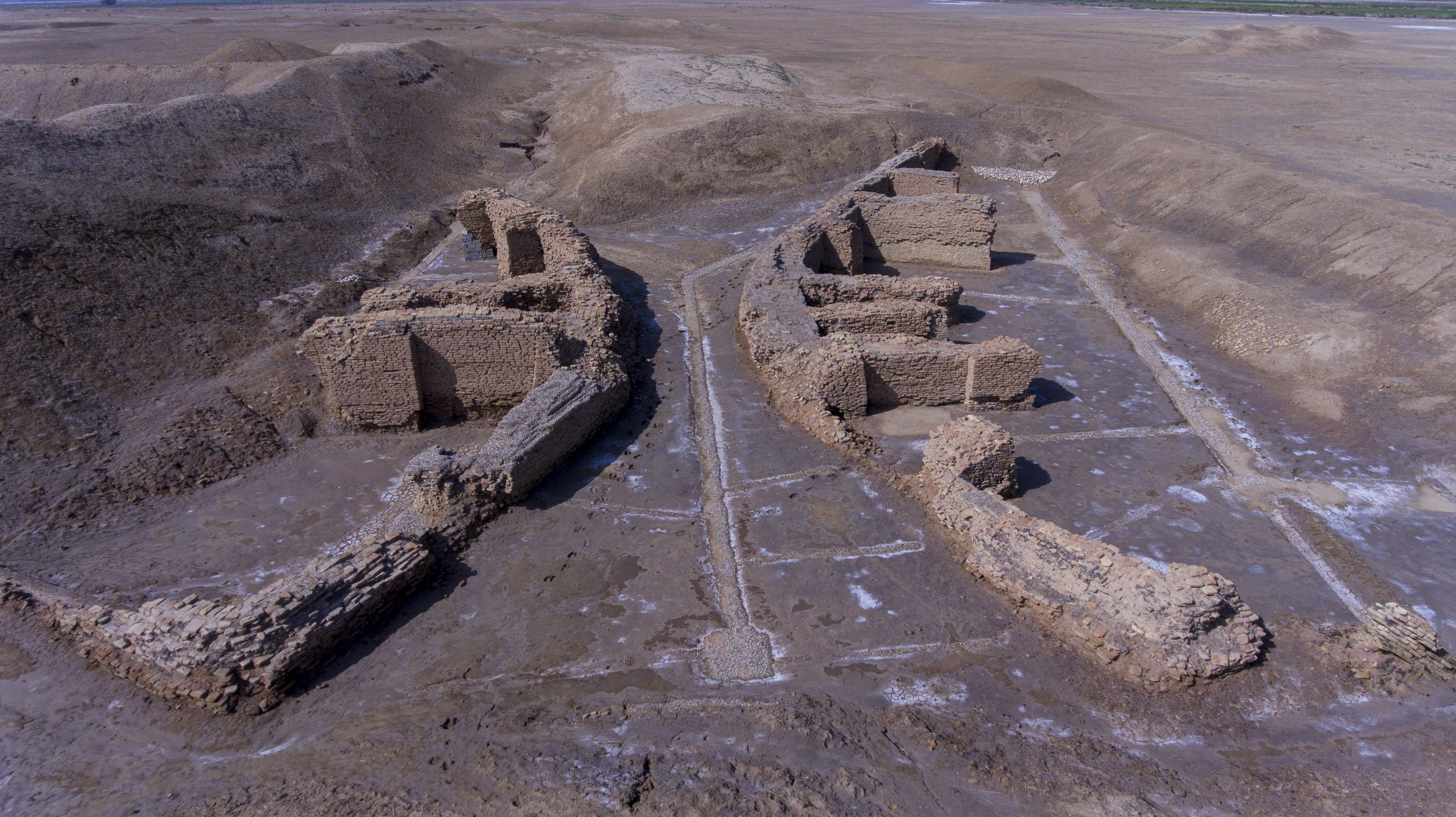 What is considered a world's oldest bridge, some 4,000 years old, is seen by the ancient city-state of Girsu, near Nasiriyah, Iraq, Thursday, Feb. 23, 2023. (AP Photo/Nabil al-Jourani)