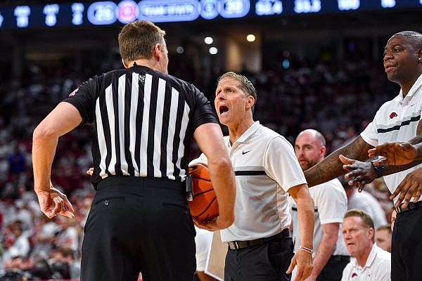 Arkansas head coach Eric Musselman speaks to an official, Saturday, March 4, 2023, during the first half against the Kentucky Wildcats at Bud Walton Arena in Fayetteville. Visit nwaonline.com/photo for today's photo gallery....(NWA Democrat-Gazette/Hank Layton)