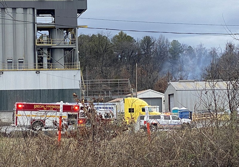 Emergency personnel from various agencies, including the Little Rock Fire Department, respond to the scene of a fatal plane crash near the 3M plant in Little Rock in this Feb. 22, 2023 file photo. (Arkansas Democrat-Gazette/Staci Vandagriff)