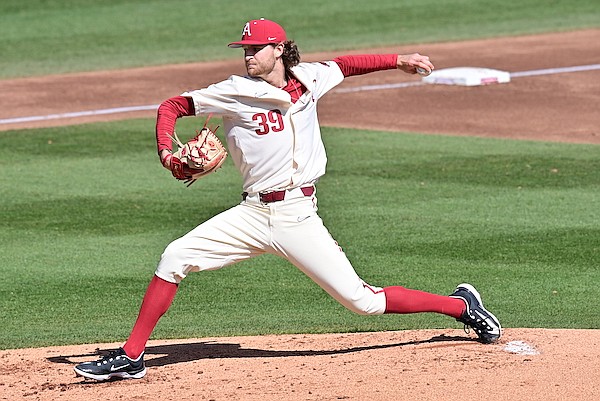 Arkansas pitcher Hunter Hollan throws during a game against Wright State on Sunday, March 5, 2023, in Fayetteville.