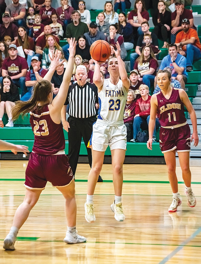 Fatima’s Vivian Bax puts up a short jump shot as Eldon's Haley Henderson defends during Saturday afternoon’s Class 4 District 10 Tournament championship game at Blair Oaks High School in Wardsville. (Ken Barnes/News Tribune)