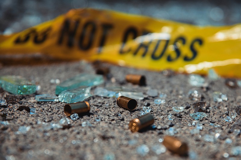 Bullet casings are shown at a crime scene. / Getty Images