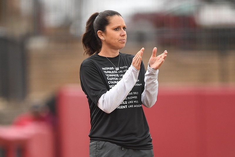 Arkansas coach Courtney Deifel directs her team Thursday, March 2, 2023, during the Razorbacks’ 4-0 win over Iowa State at Bogle Park in Fayetteville.