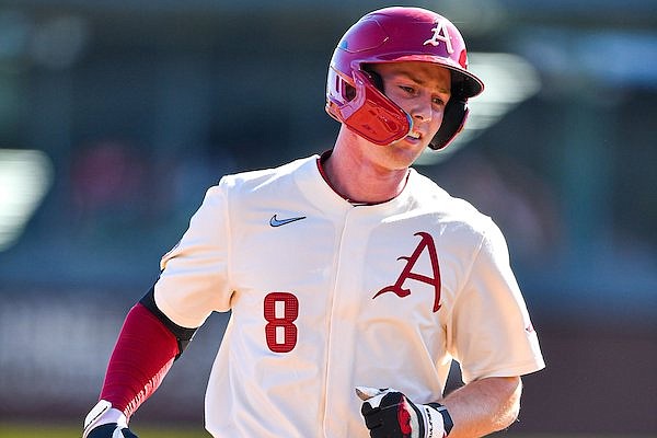 Arkansas outfielder Jace Bohrofen (8) trots around the bases after hitting a solo home run, Sunday, March 5, 2023, during the sixth inning of the Razorbacks’ 6-2 win over the Wright State Raiders at Baum-Walker Stadium in Fayetteville.