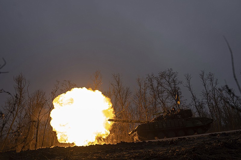 A Ukrainian tank fires at Russian positions Wednesday near Bakhmut, Ukraine.
(AP/Evgeniy Maloletka)