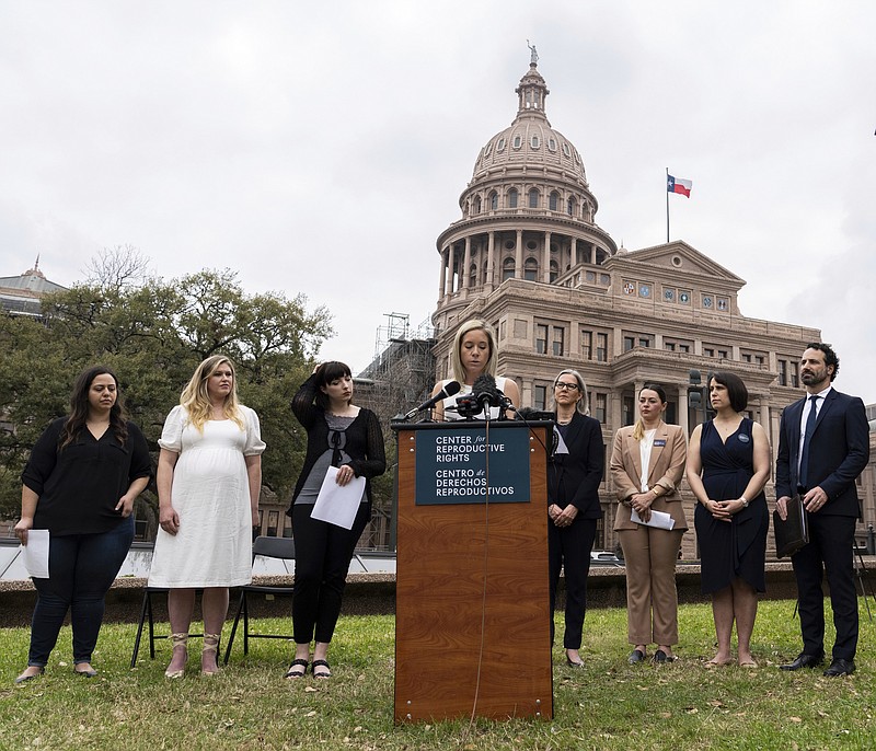 Amanda Zurawski, one of five plaintiffs in Zurawski v. State of Texas, speaks in front of the Texas State Capitol in Austin, Texas, Tuesday, March 7, 2023, as the Center for Reproductive Rights and the plaintiffs announced their lawsuit, which asks for clarity in Texas law as to when abortions can be provided under the "medical emergency" exception. All five women were denied medical care while experiencing pregnancy complications that threatened their health and lives. (Sara Diggins/Austin American-Statesman via AP)