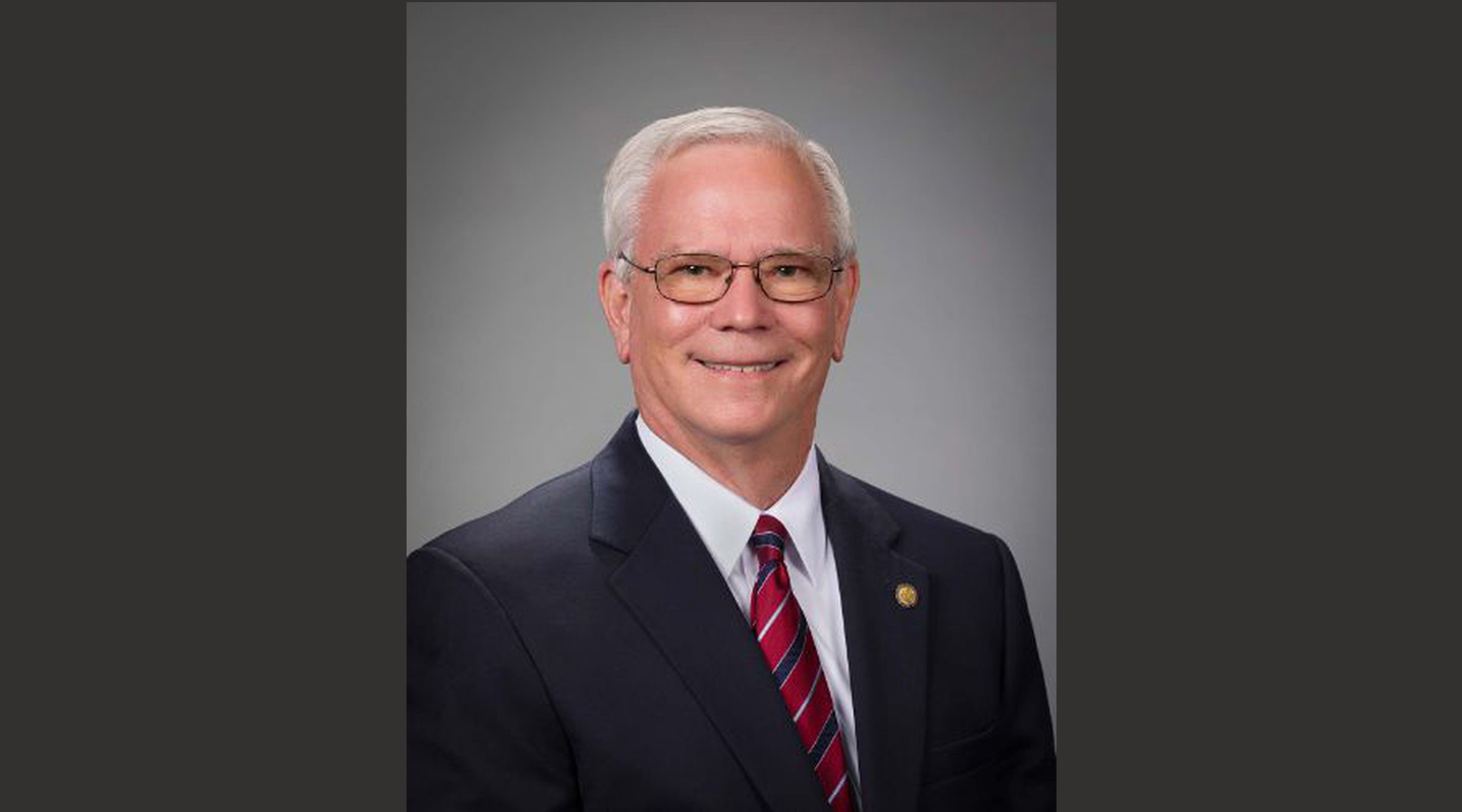 Retired representative pauses mission work to help governor