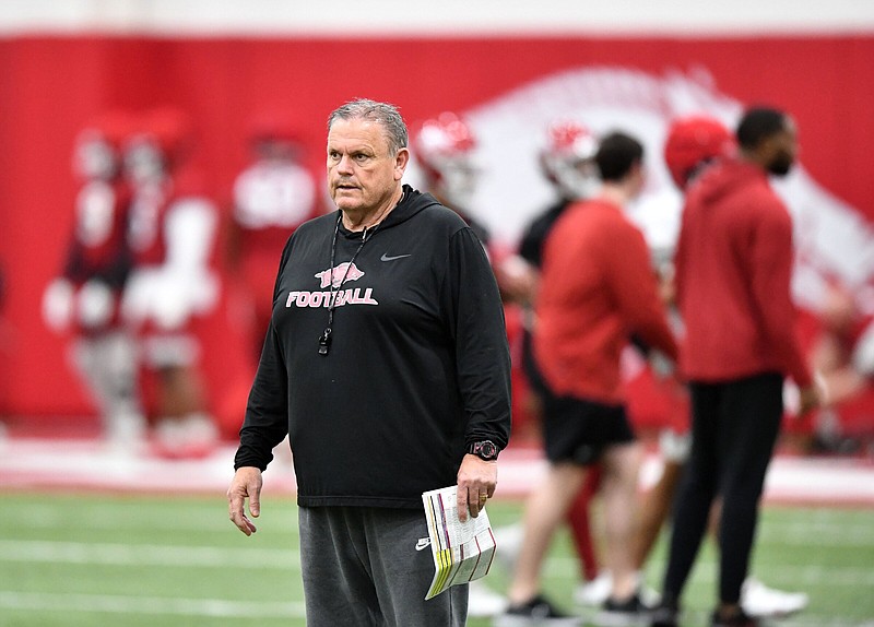 Arkansas football Coach Sam Pittman watches over the Razorbacks’ first practice of spring drills Thursday at the Walker Pavilion in Fayetteville.
(NWA Democrat-Gazette/Andy Shupe)